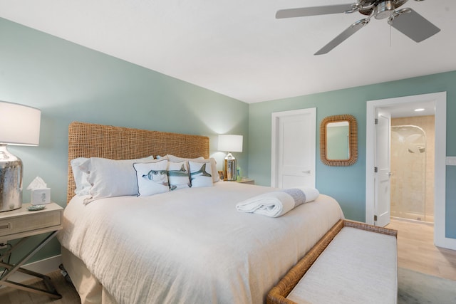 bedroom featuring ensuite bathroom, ceiling fan, and light hardwood / wood-style floors