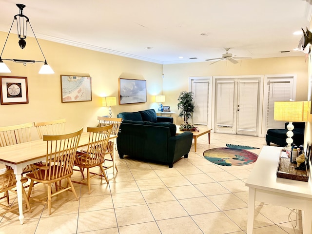 living room featuring light tile patterned floors, ornamental molding, a ceiling fan, and recessed lighting