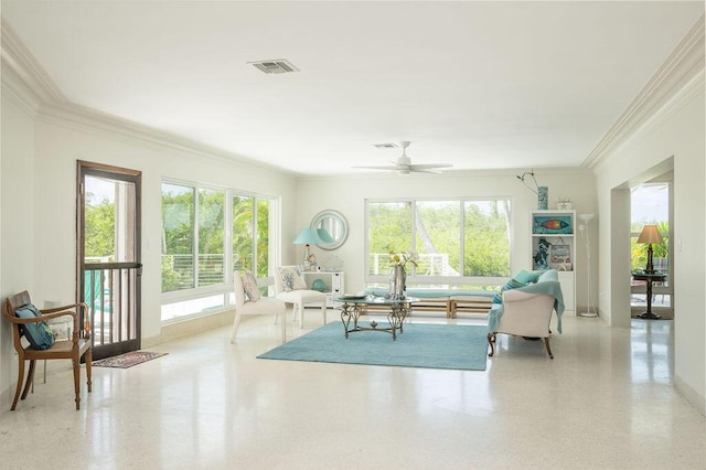 sunroom / solarium featuring ceiling fan