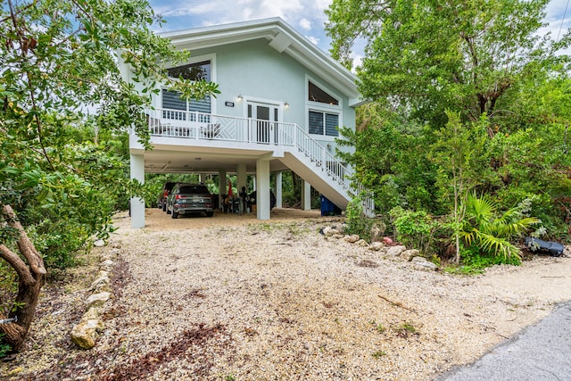 view of front of house with a carport