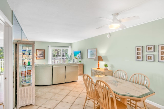 201 E Ocean Dr Unit 110, Key Colony, FL 33051 - dining area with light tile patterned floors and a ceiling fan