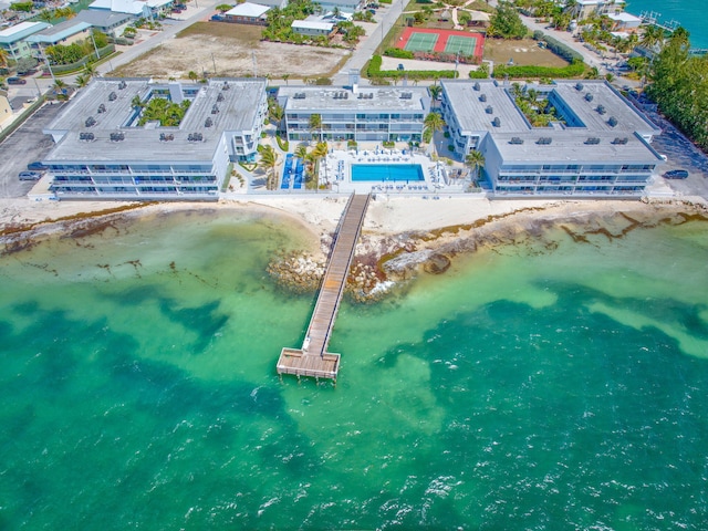 201 E Ocean Dr Unit 110, Key Colony, FL 33051 - aerial view of a pool area and a nearby body of water