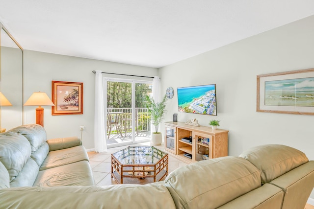 201 E Ocean Dr Unit 110, Key Colony, FL 33051 - living room with light tile patterned floors and baseboards