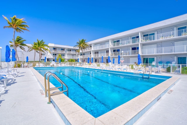 201 E Ocean Dr Unit 110, Key Colony, FL 33051 - community pool featuring a patio