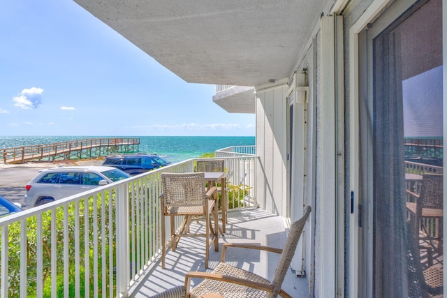 201 E Ocean Dr Unit 110, Key Colony, FL 33051 - balcony featuring a water view