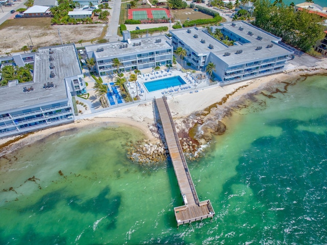 201 E Ocean Dr Unit 110, Key Colony, FL 33051 - bird's eye view of a pool area and a nearby body of water