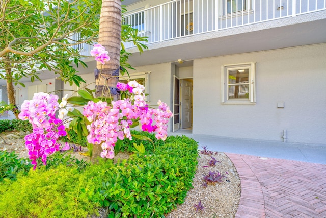 201 E Ocean Dr Unit 110, Key Colony, FL 33051 - entrance to property featuring a balcony and stucco siding