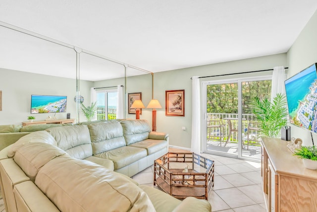201 E Ocean Dr Unit 110, Key Colony, FL 33051 - living area with light tile patterned floors and baseboards