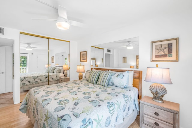 201 E Ocean Dr Unit 110, Key Colony, FL 33051 - bedroom featuring ceiling fan and light wood-type flooring