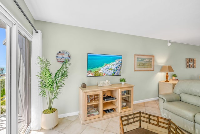 201 E Ocean Dr Unit 110, Key Colony, FL 33051 - living room with light tile patterned floors