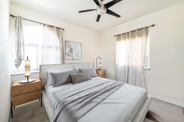 bedroom with crown molding and ceiling fan