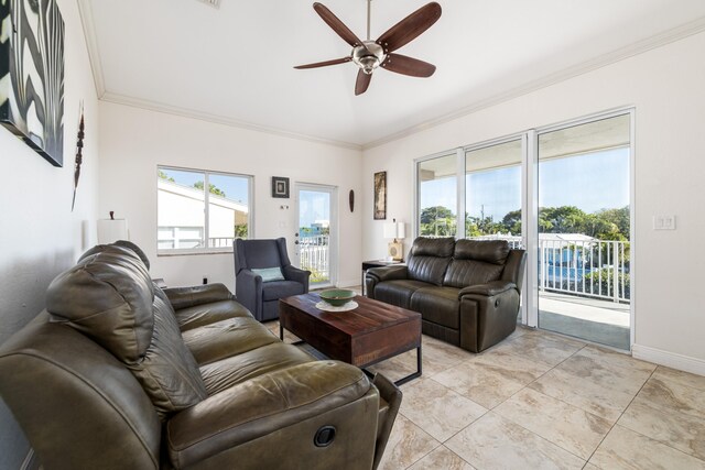 living room featuring crown molding and ceiling fan