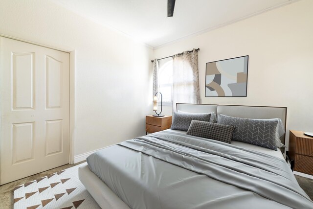 bedroom with crown molding