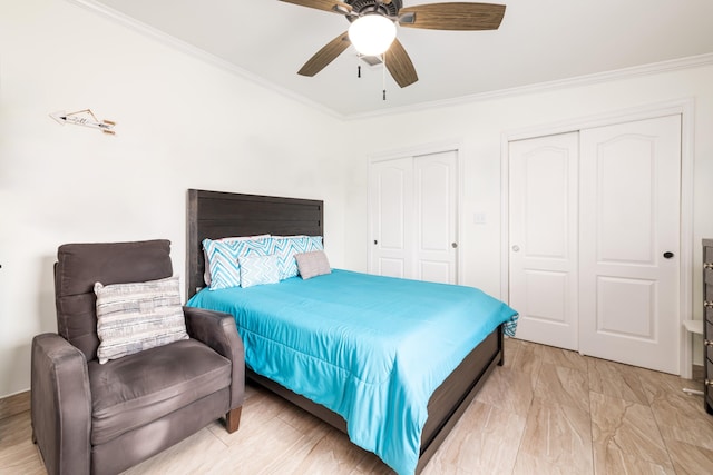 7 125th St, Gulf, Marathon, FL 33050 - bedroom with two closets, ornamental molding, and a ceiling fan