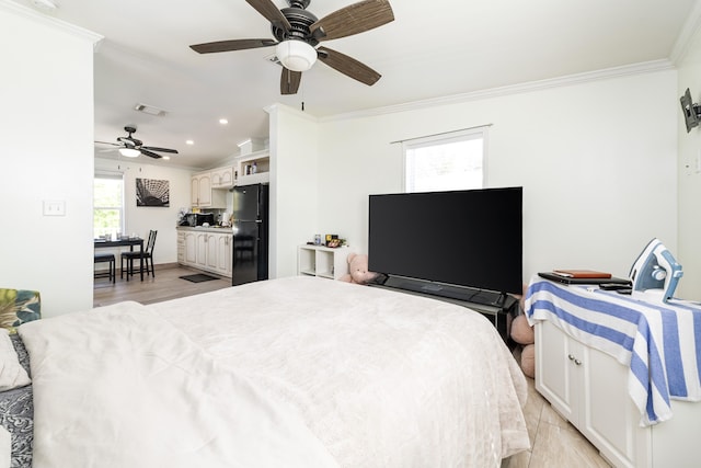 7 125th St, Gulf, Marathon, FL 33050 - bedroom with freestanding refrigerator, ornamental molding, vaulted ceiling, light wood-style flooring, and recessed lighting