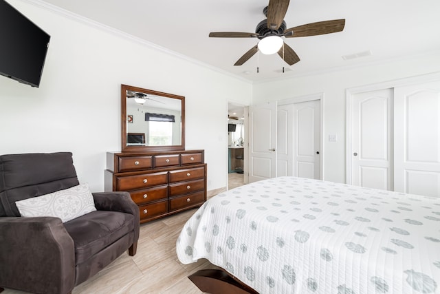 7 125th St, Gulf, Marathon, FL 33050 - bedroom with two closets, crown molding, and a ceiling fan