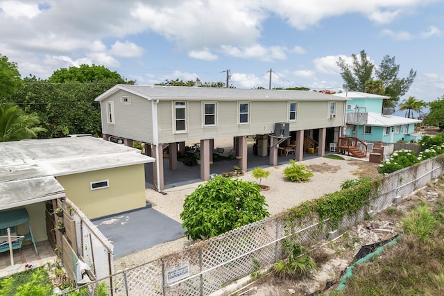 7 125th St, Gulf, Marathon, FL 33050 - back of property featuring a fenced backyard