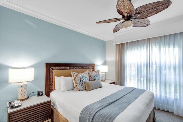 bedroom featuring ornamental molding and a ceiling fan