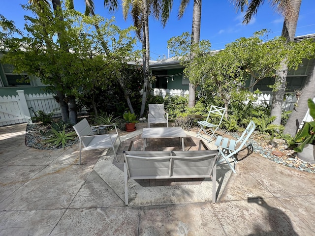 view of patio featuring fence