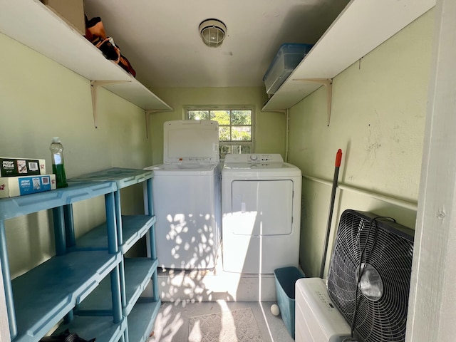 laundry area with laundry area and independent washer and dryer