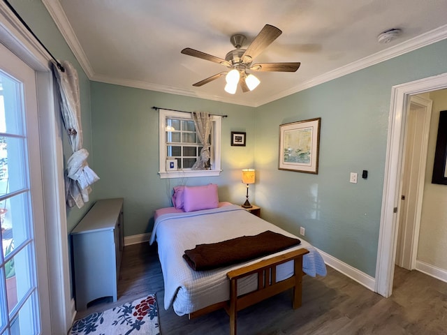 bedroom with multiple windows, ornamental molding, and dark wood-style flooring