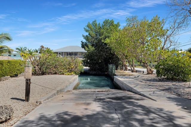119 Cortez Dr Unit 8G, Islamorada, FL 33036 - view of pool with a boat ramp