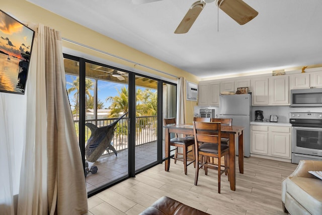 119 Cortez Dr Unit 8G, Islamorada, FL 33036 - dining area featuring ceiling fan and light wood-style floors