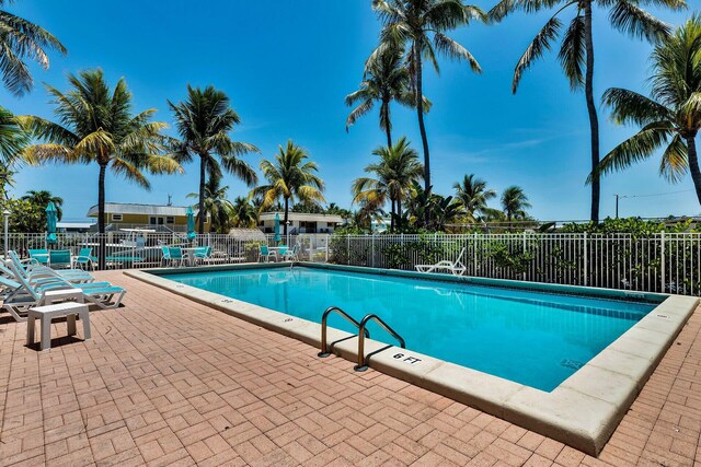 119 Cortez Dr Unit 8G, Islamorada, FL 33036 - community pool with a patio area