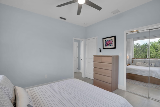 bedroom with baseboards, a ceiling fan, visible vents, and access to exterior