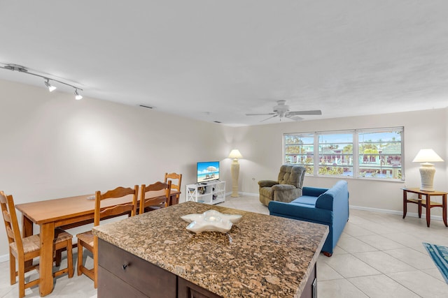 460470 11th St, Key Colony, FL 33051 - interior space featuring light tile patterned floors, baseboards, visible vents, ceiling fan, and track lighting