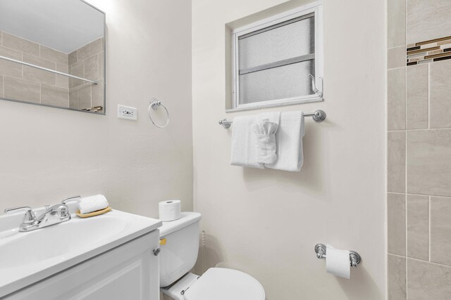 460470 11th St, Key Colony, FL 33051 - full bath featuring toilet, a tile shower, and vanity