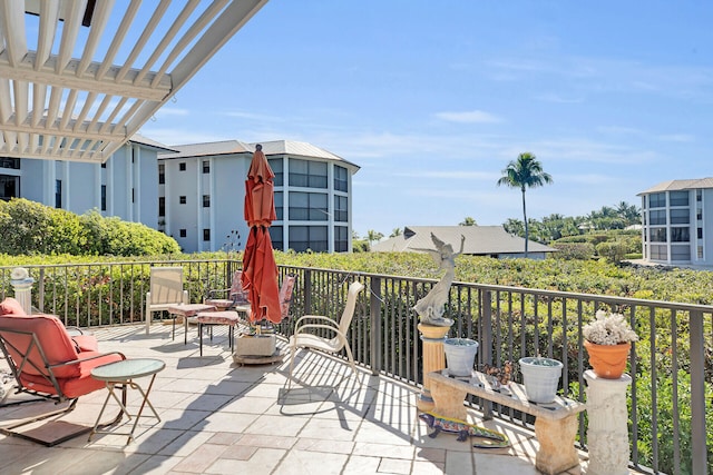 view of patio featuring a pergola