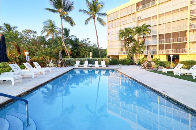 community pool with a patio