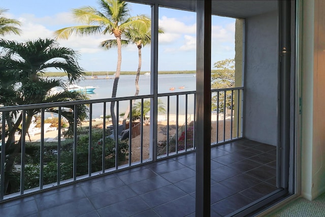 balcony featuring a water view