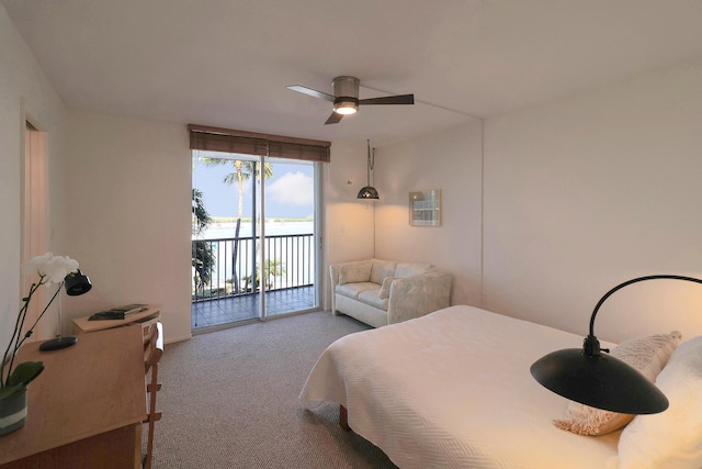 carpeted bedroom featuring access to exterior and a ceiling fan