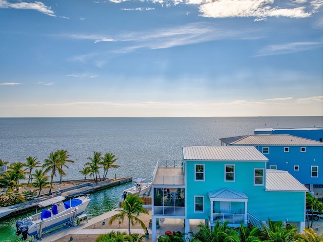 property view of water with a dock