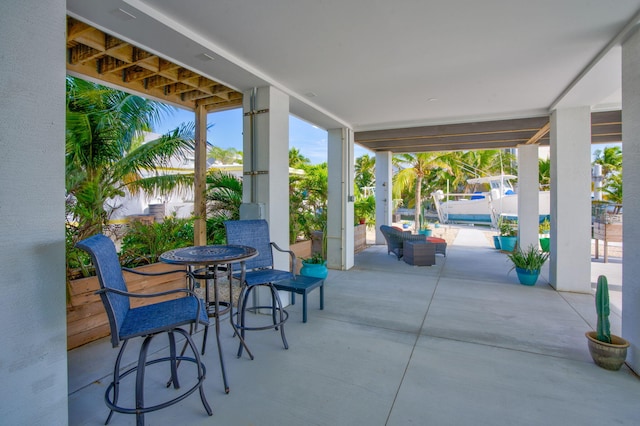 view of patio / terrace featuring a swimming pool