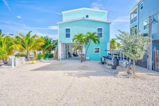 view of front of home featuring a carport