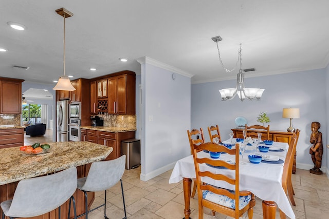 kitchen with stainless steel appliances, ornamental molding, decorative backsplash, decorative light fixtures, and a chandelier