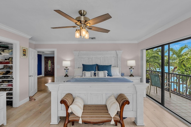 bedroom with ornamental molding, access to exterior, ceiling fan, and light hardwood / wood-style flooring