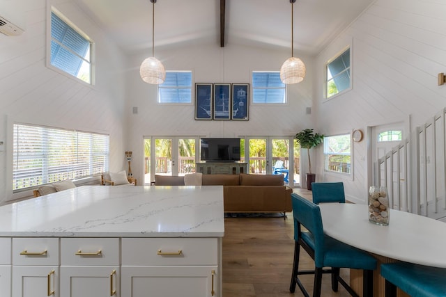 460 Barry Ave, Little Torch, FL 33042 - kitchen featuring high vaulted ceiling, dark wood-style flooring, a wall mounted air conditioner, beamed ceiling, and open floor plan