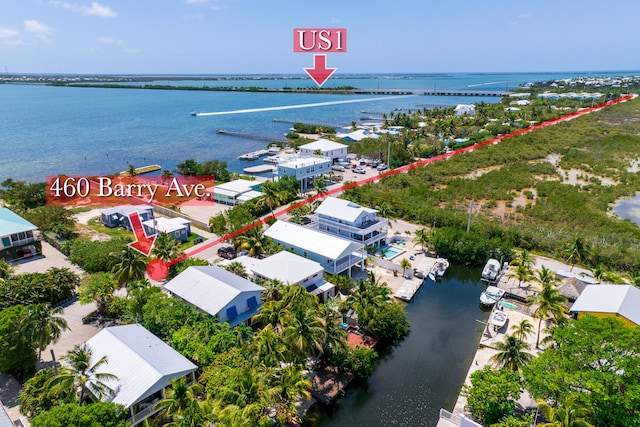460 Barry Ave, Little Torch, FL 33042 - aerial view of residential area with a nearby body of water and a notable bridge