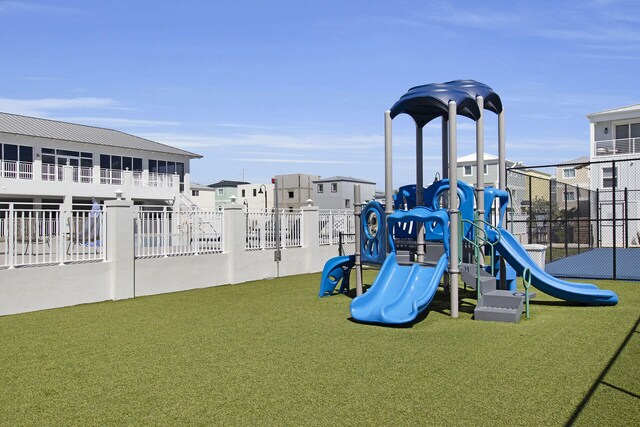 view of play area featuring a yard