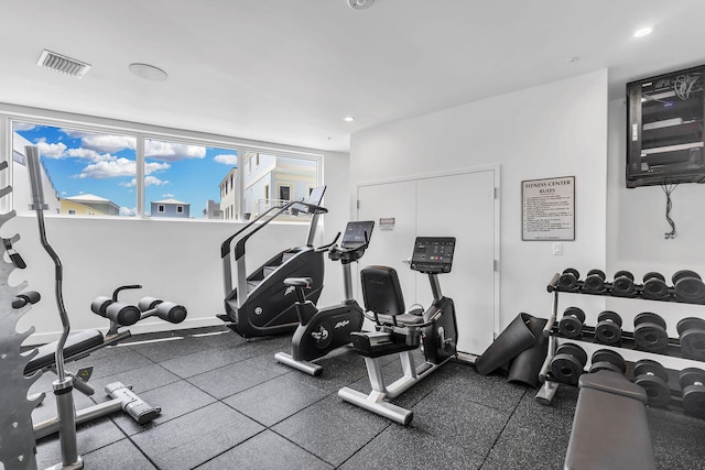 gym featuring recessed lighting and visible vents