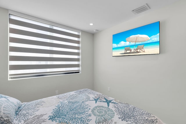 bedroom with recessed lighting and visible vents