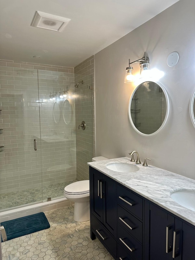 18 Palm Dr, Key Largo, FL 33037 - bathroom with double vanity, a stall shower, toilet, and tile patterned flooring