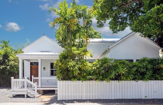 400 Aronovitz Ln, Key West, FL 33040 - view of front of property featuring covered porch and fence