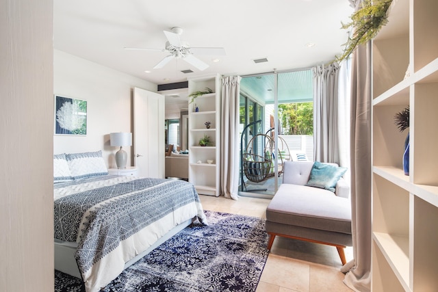 bedroom featuring light tile patterned flooring, ceiling fan, and access to exterior