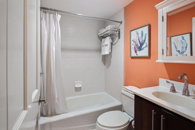 full bathroom featuring vanity, toilet, and shower / tub combo