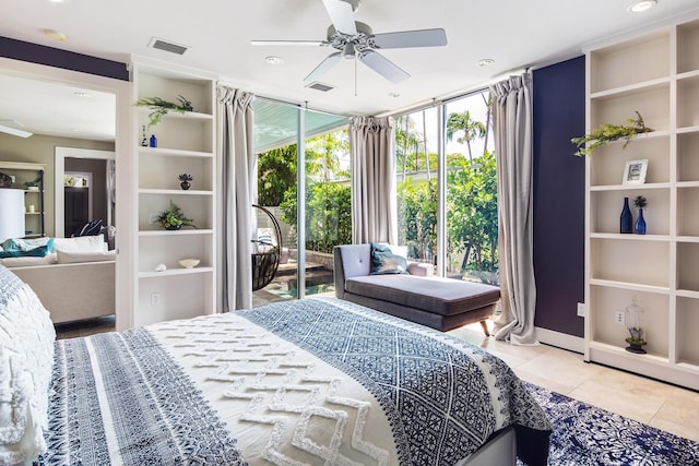 400 Aronovitz Ln, Key West, FL 33040 - tiled bedroom featuring recessed lighting, expansive windows, visible vents, and access to outside